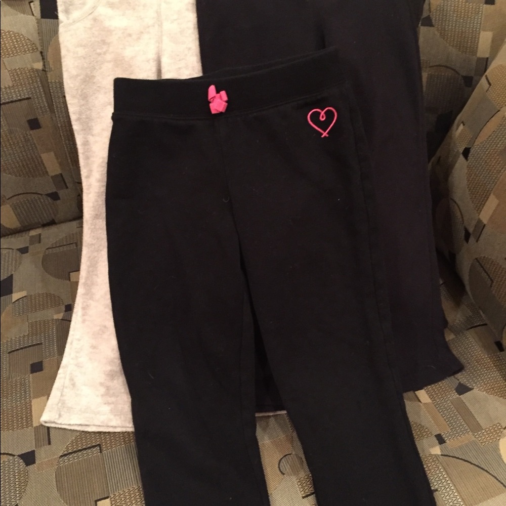 A lot of three pairs of soft pants for girls